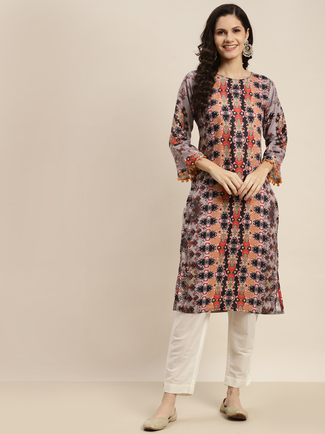 

Tikhi Imli Women Black & Orange Printed Kurta