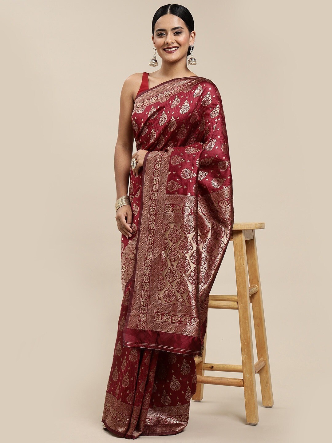 

Mitera Maroon & Gold-Toned Ethnic Motifs Zari Silk Blend Banarasi Saree