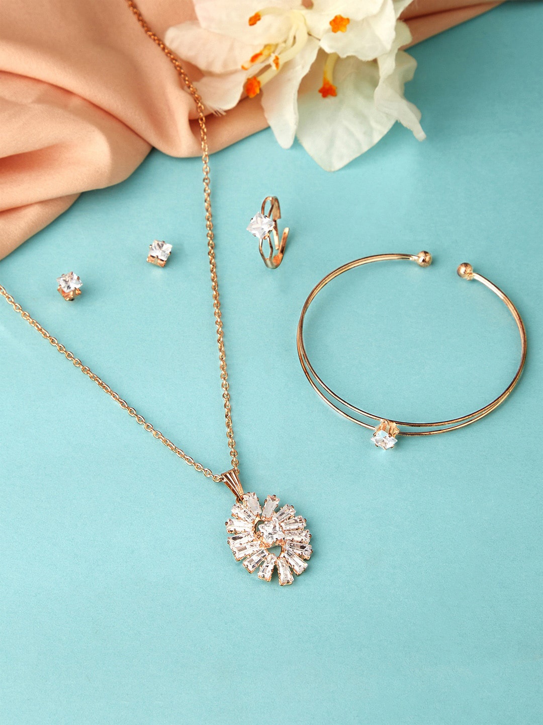 

Rubans Women Rose Gold-Toned & Plated AD Studded Pendant Set With Bracelet & Ring