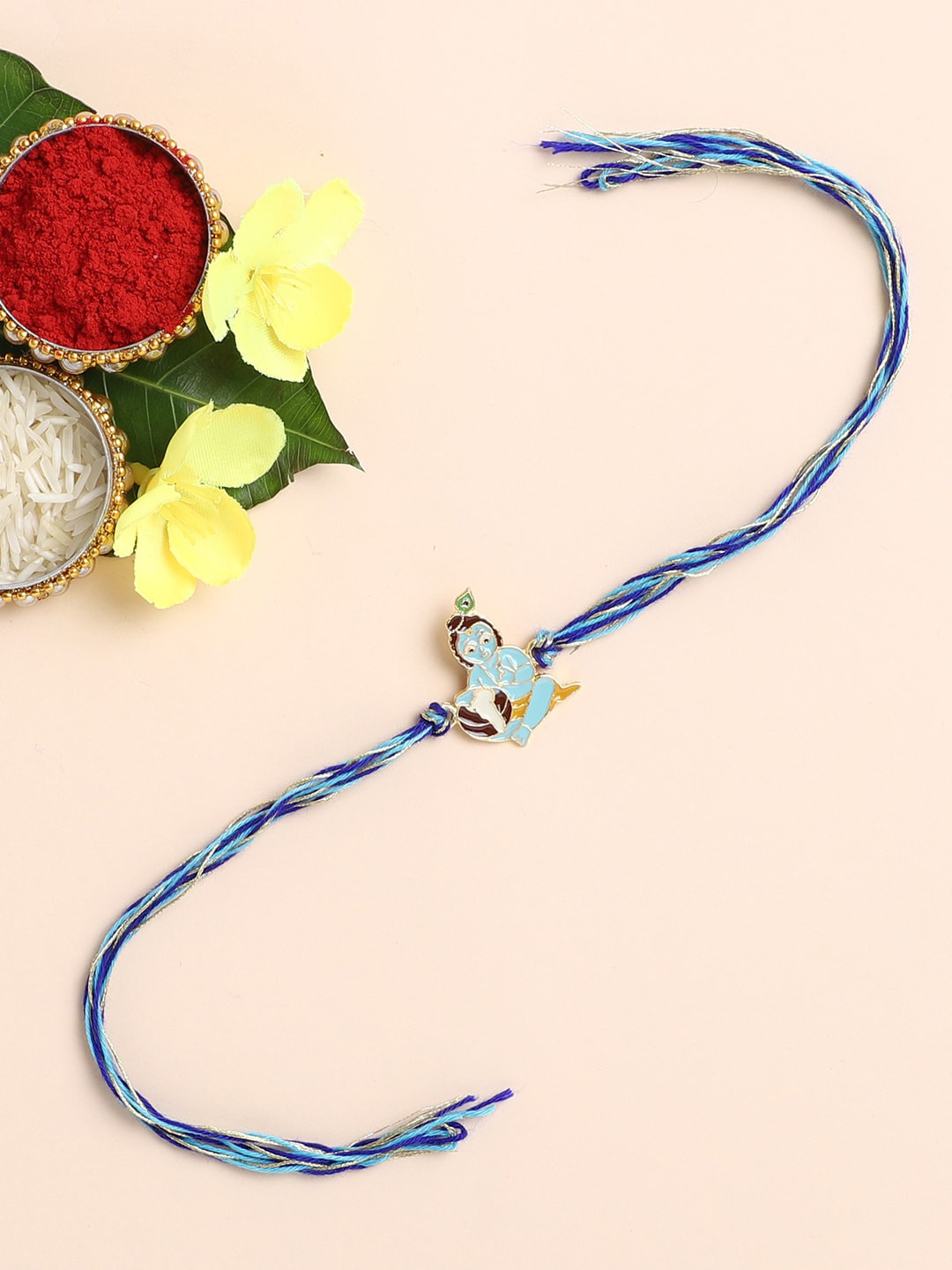 

The Magic Wand Blue Krishna Thread Rakhi With Roli-Chawal