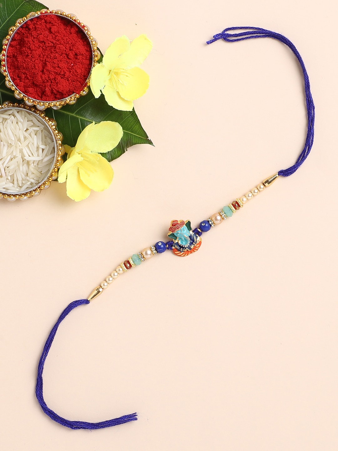 

The Magic Wand Gold-Toned & Blue Beaded Rakhi