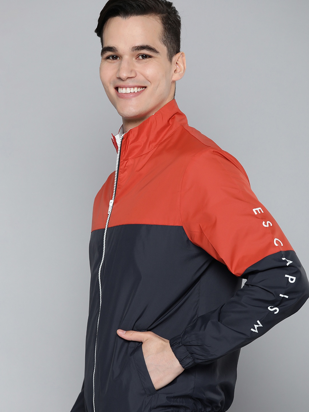 

Mast & Harbour Men Navy Blue & Orange Colourblocked Bomber Jacket