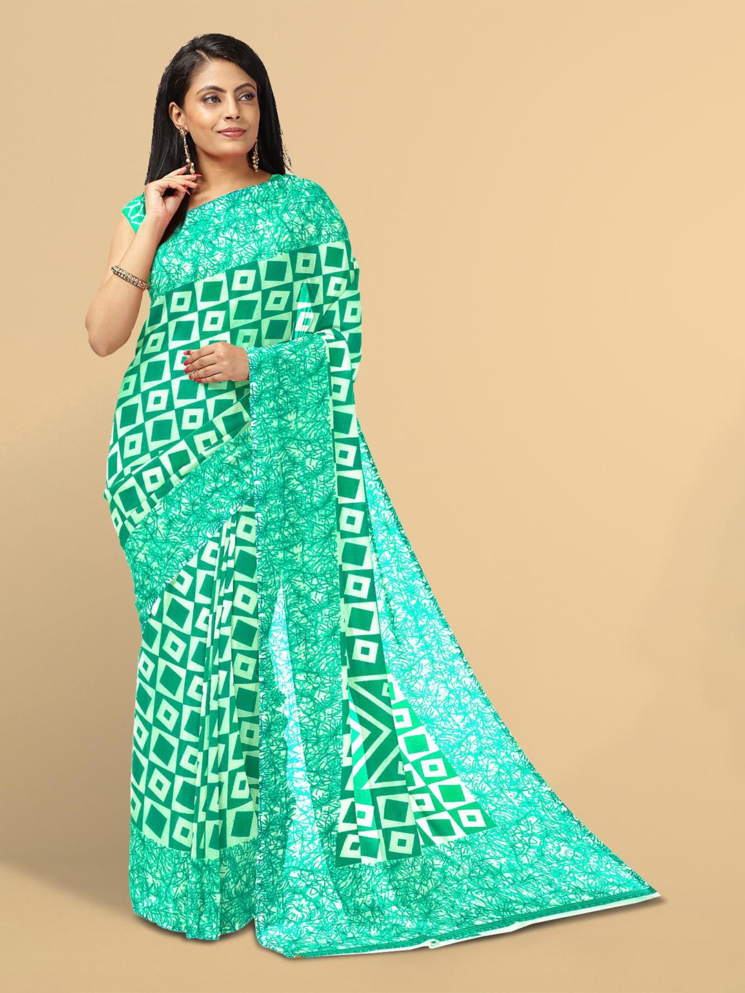 

Kalamandir Sea Green & White Printed Saree