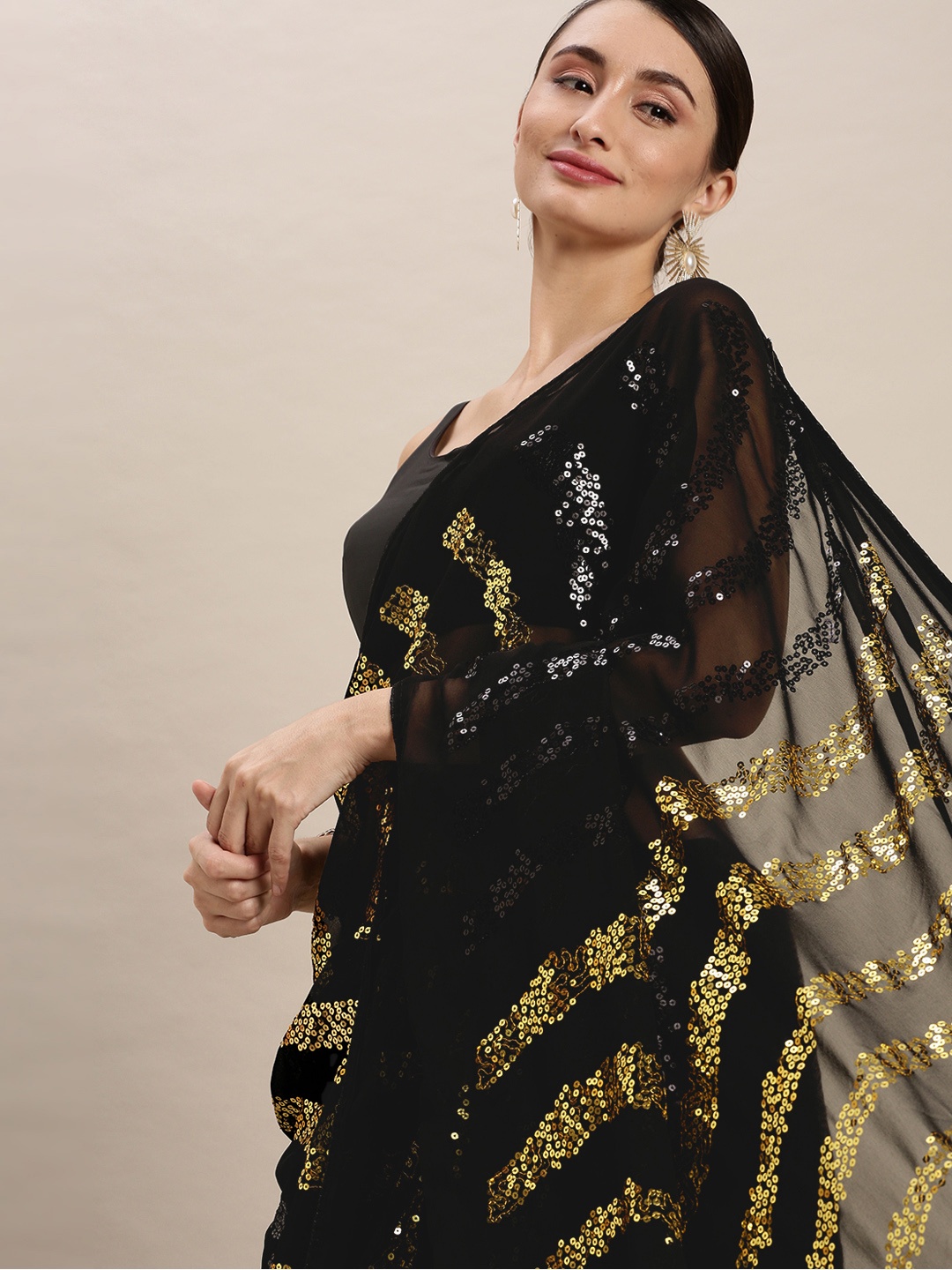 

VASTRANAND Yellow & Black Embellished Sequinned Saree