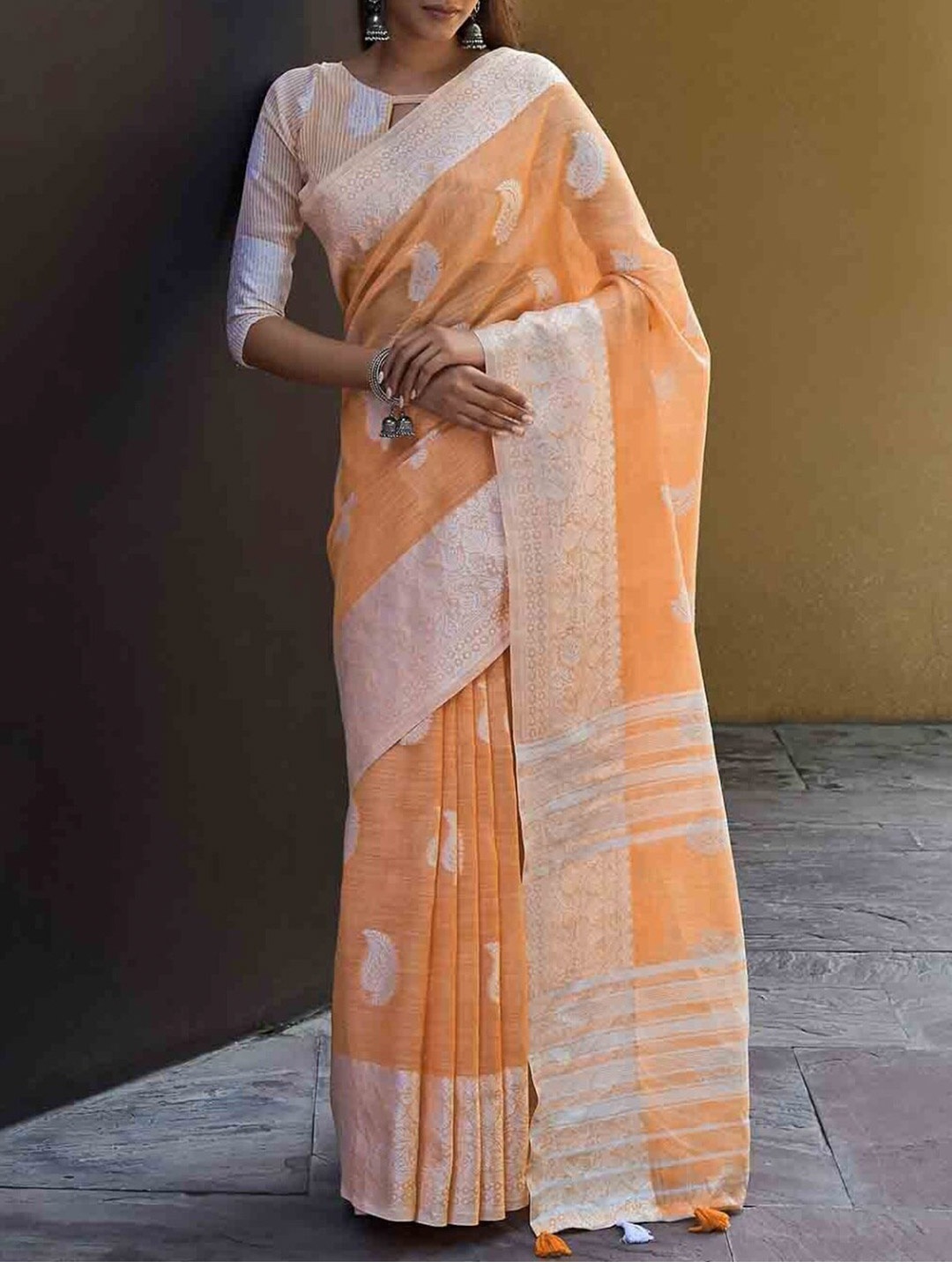 

KARAGIRI Orange & Silver-Toned Paisley Zari Linen Blend Saree