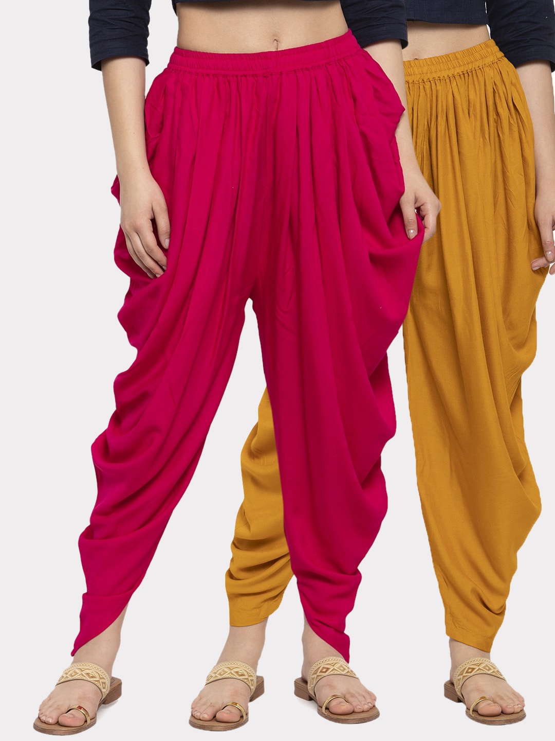 

Clora Creation Women Magenta & Mustard Pack Of 2 Solid Ankle Length Dhoti Pants
