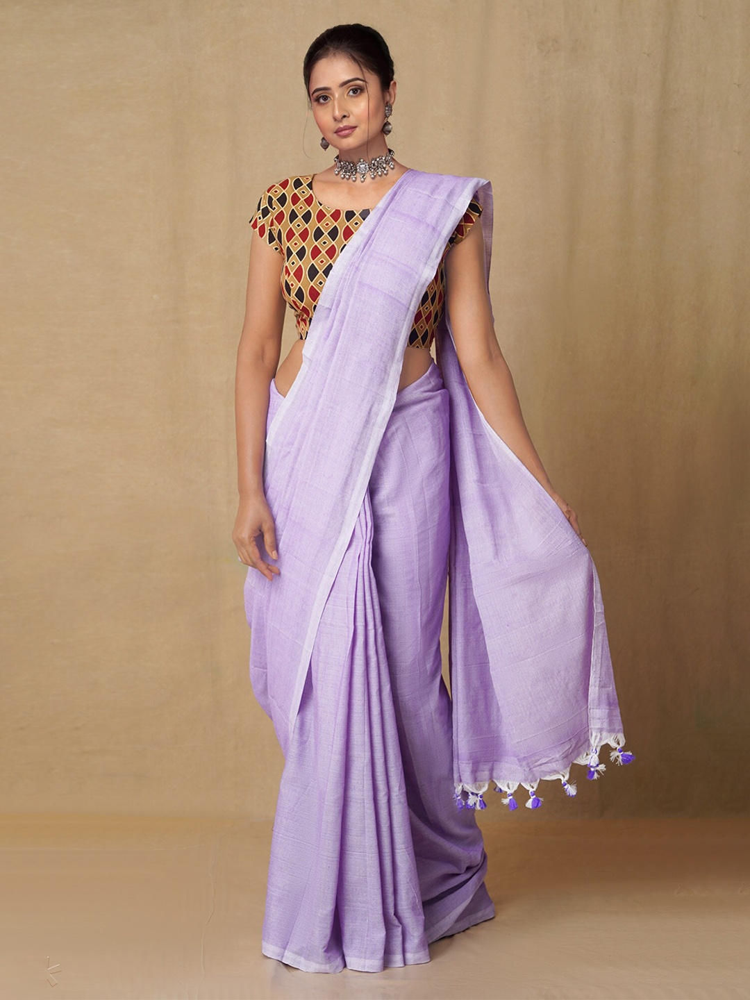 

Unnati Silks Violet & White Pure Cotton Jamdani Saree