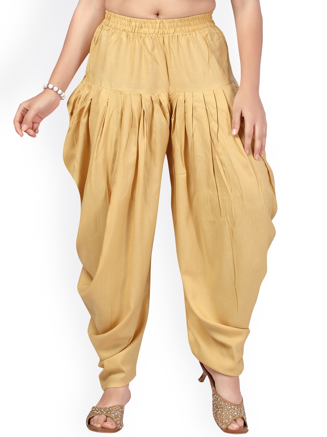 

Aarika Girls Beige Solid Cotton Salwar