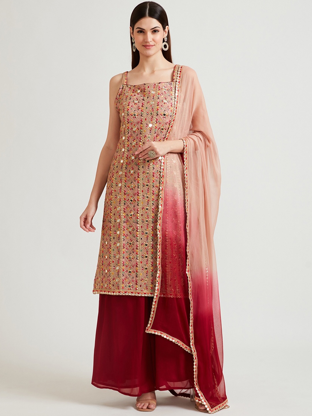 

Neerus Women Peach-Coloured Ethnic Motifs Printed Empire Mirror Work Kurta with Palazzos & With Dupatta