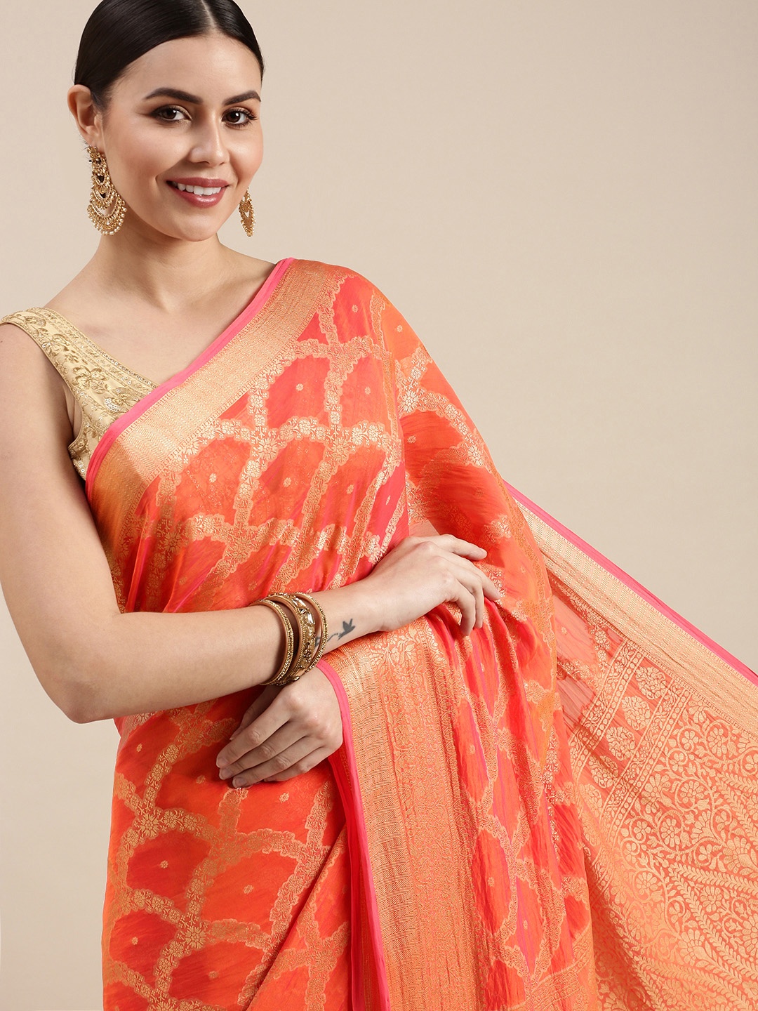 

Rani Saahiba Peach-Coloured & Golden Woven Design Saree