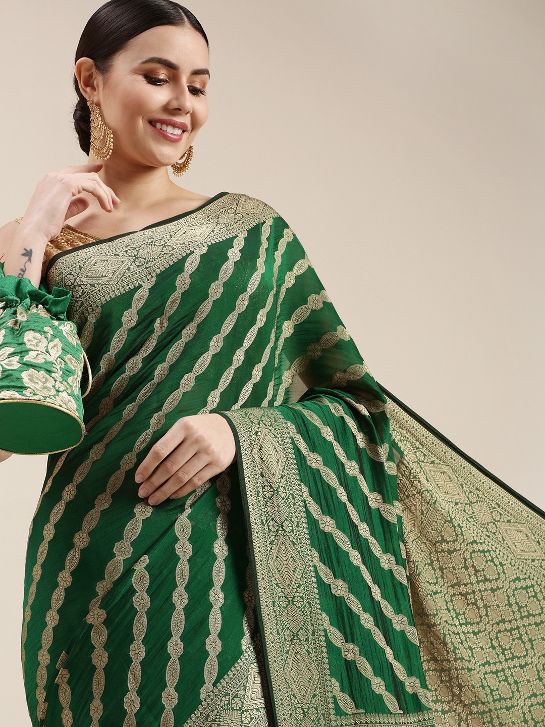 

Rani Saahiba Green & Golden Woven Design Saree