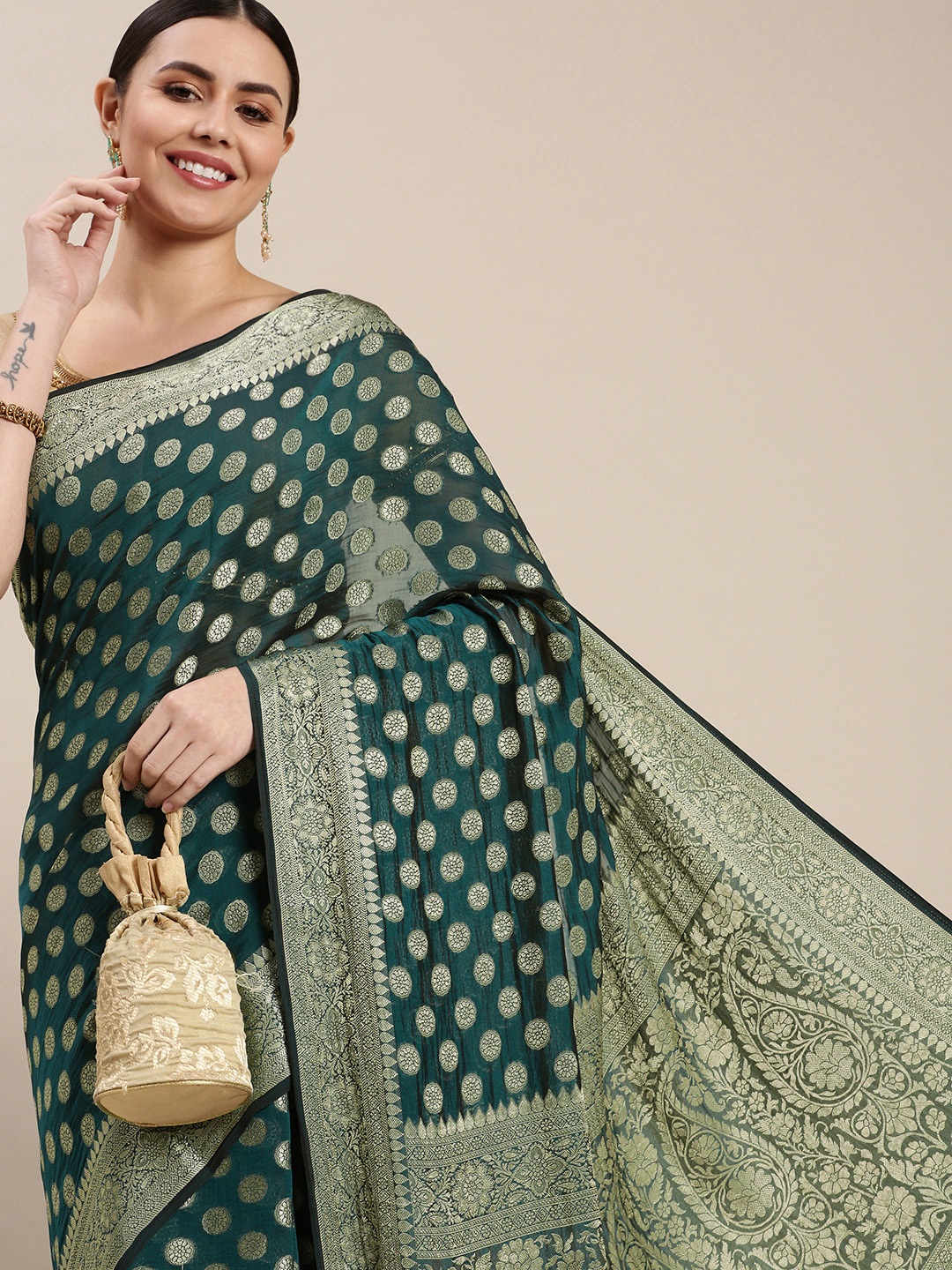 

Rani Saahiba Green & Golden Woven Design Saree