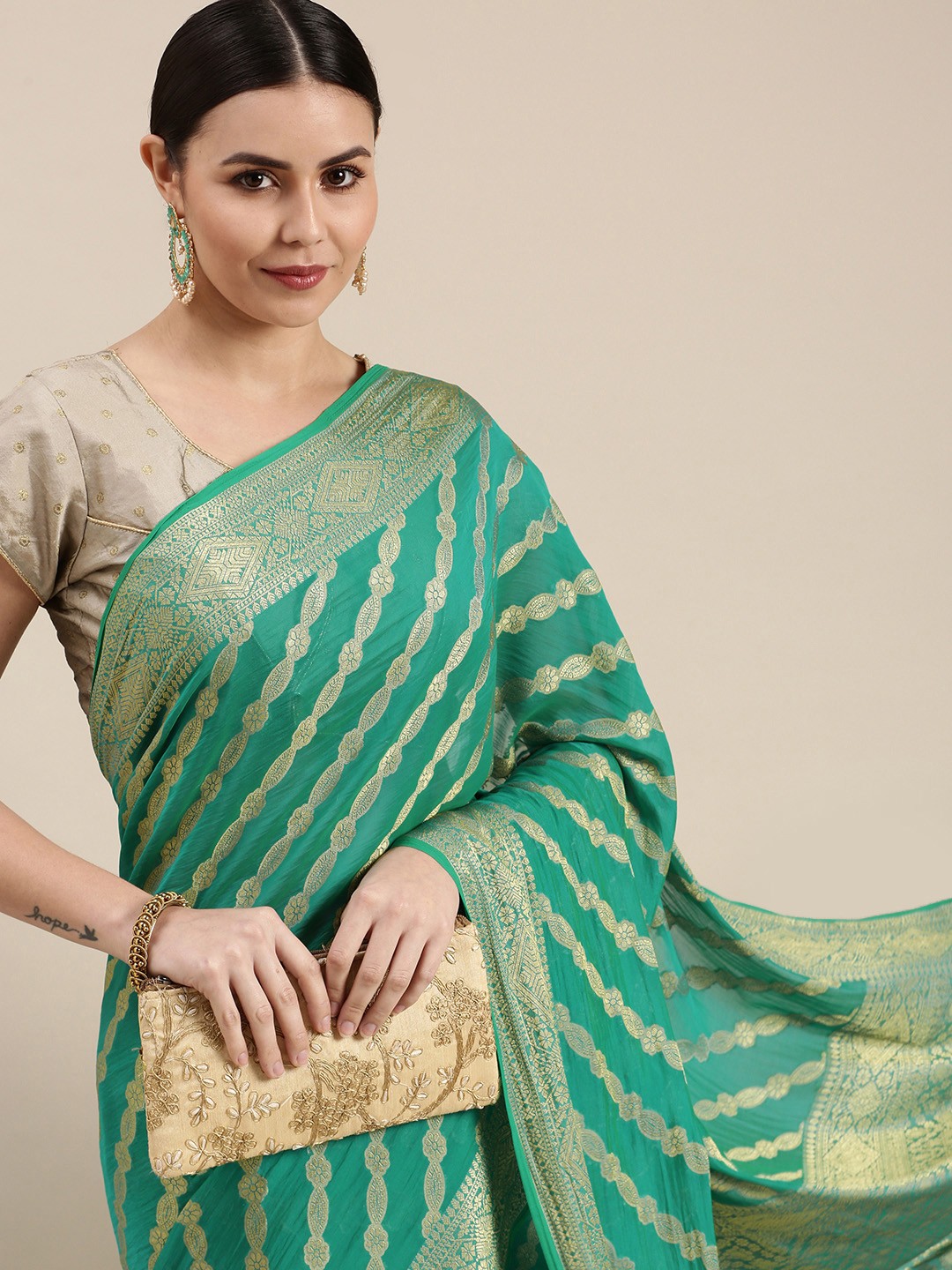 

Rani Saahiba Sea Green & Golden Woven Design Saree