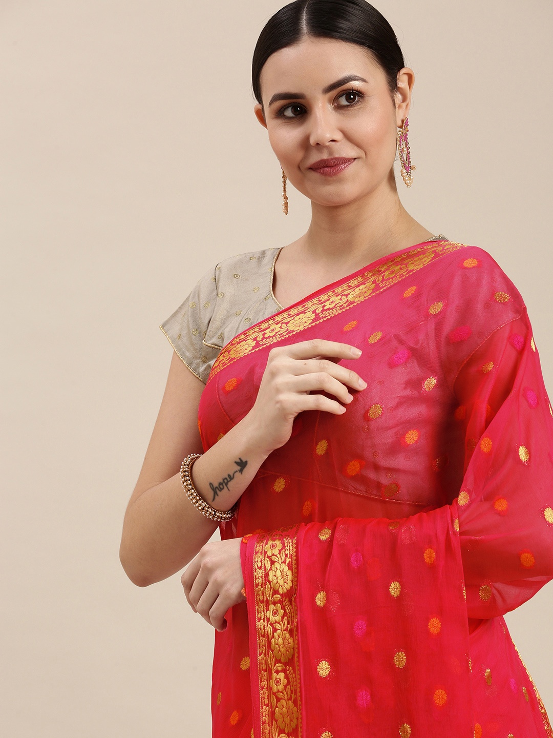 

Rani Saahiba Pink & Golden Woven Design Saree