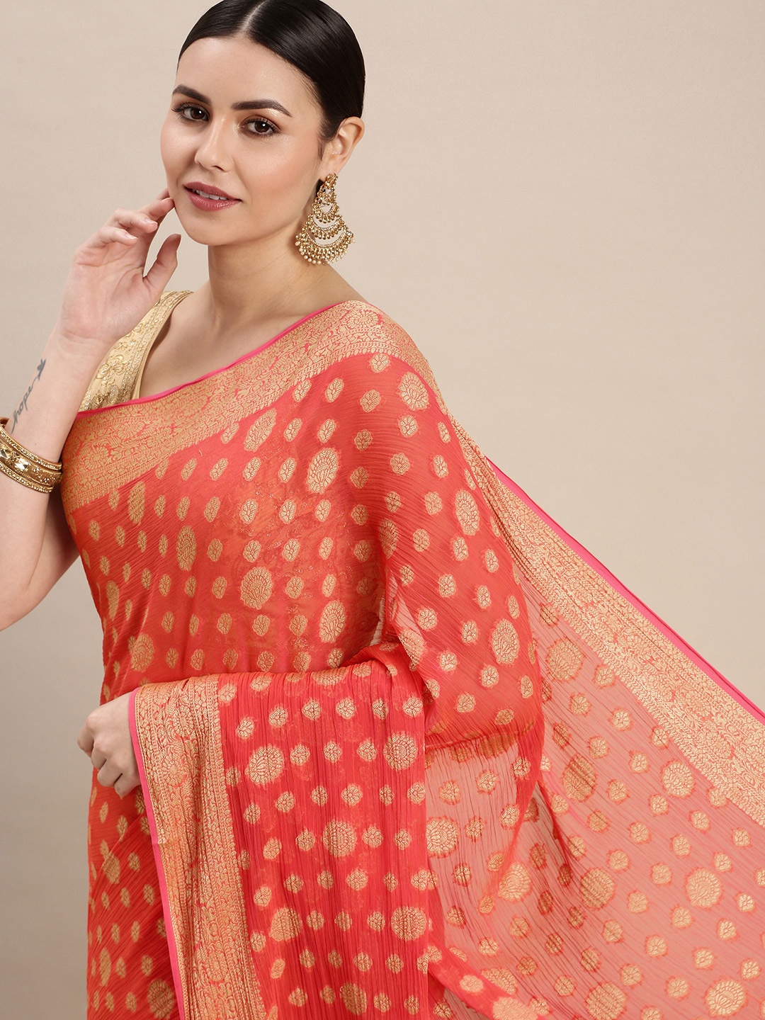 

Rani Saahiba Peach-Coloured & Golden Woven Design Saree