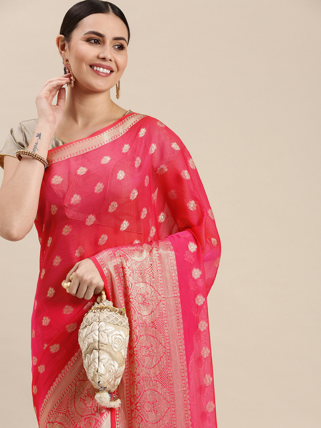 

Rani Saahiba Pink & Golden Woven Design Saree