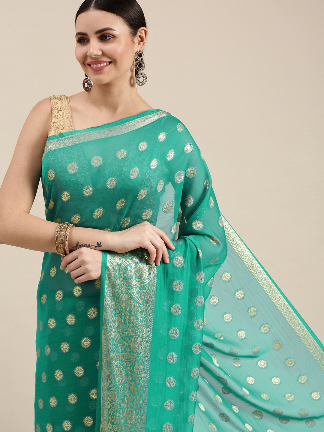 

Rani Saahiba Sea Green Woven Design Saree