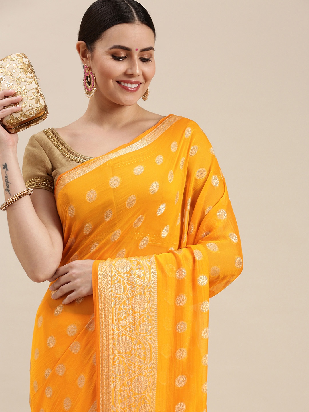 

Rani Saahiba Yellow & Golden Woven Design Saree