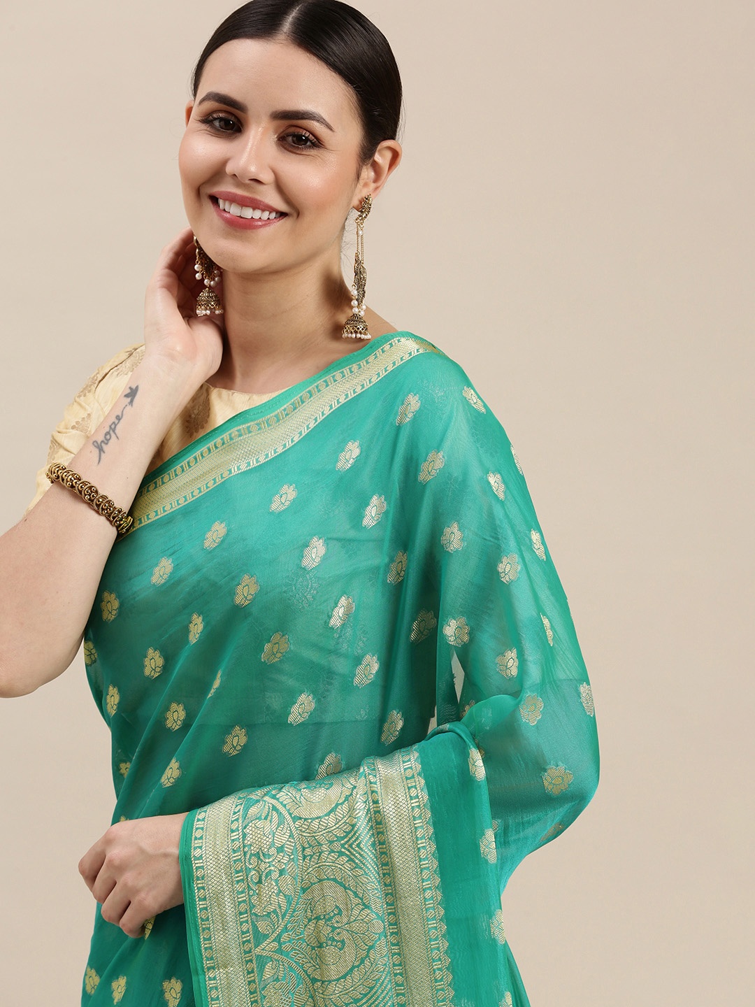 

Rani Saahiba Sea Green & Golden Woven Design Saree