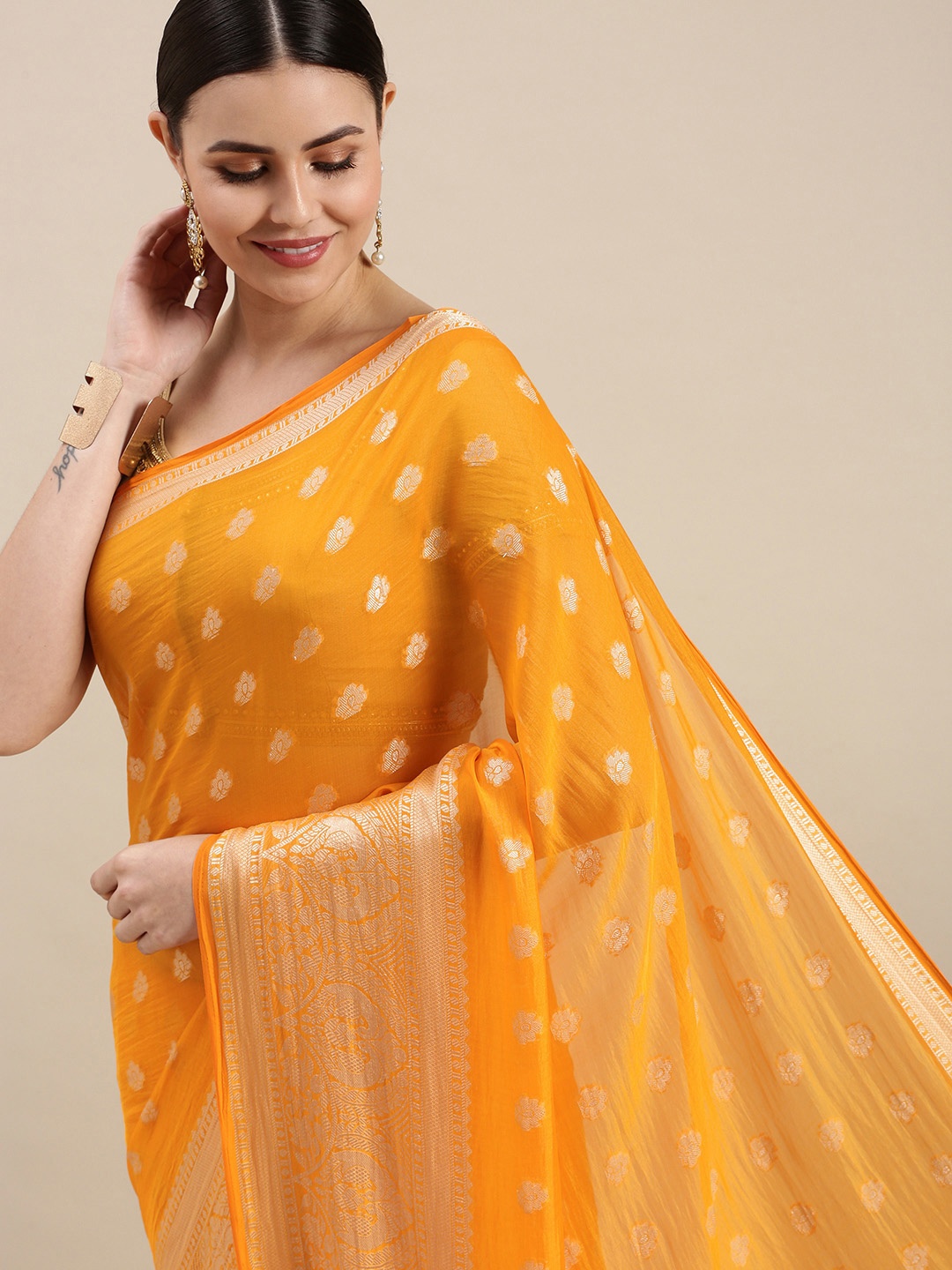 

Rani Saahiba Yellow & Golden Woven Design Saree