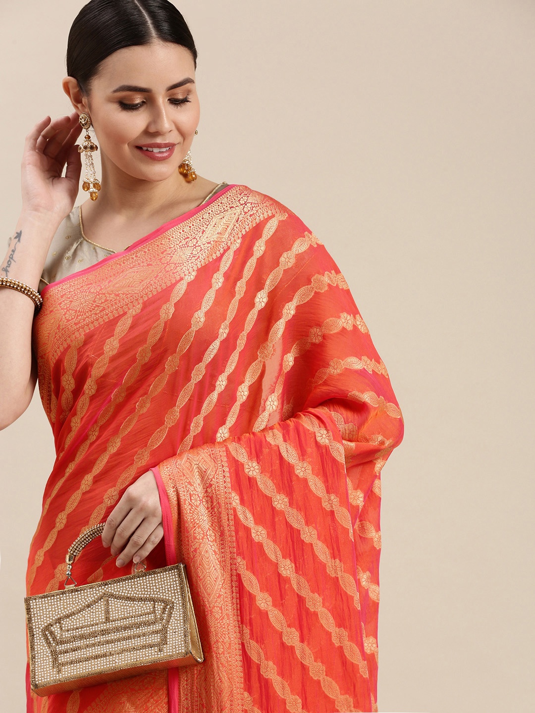 

Rani Saahiba Coral Orange & Golden Woven Design Saree