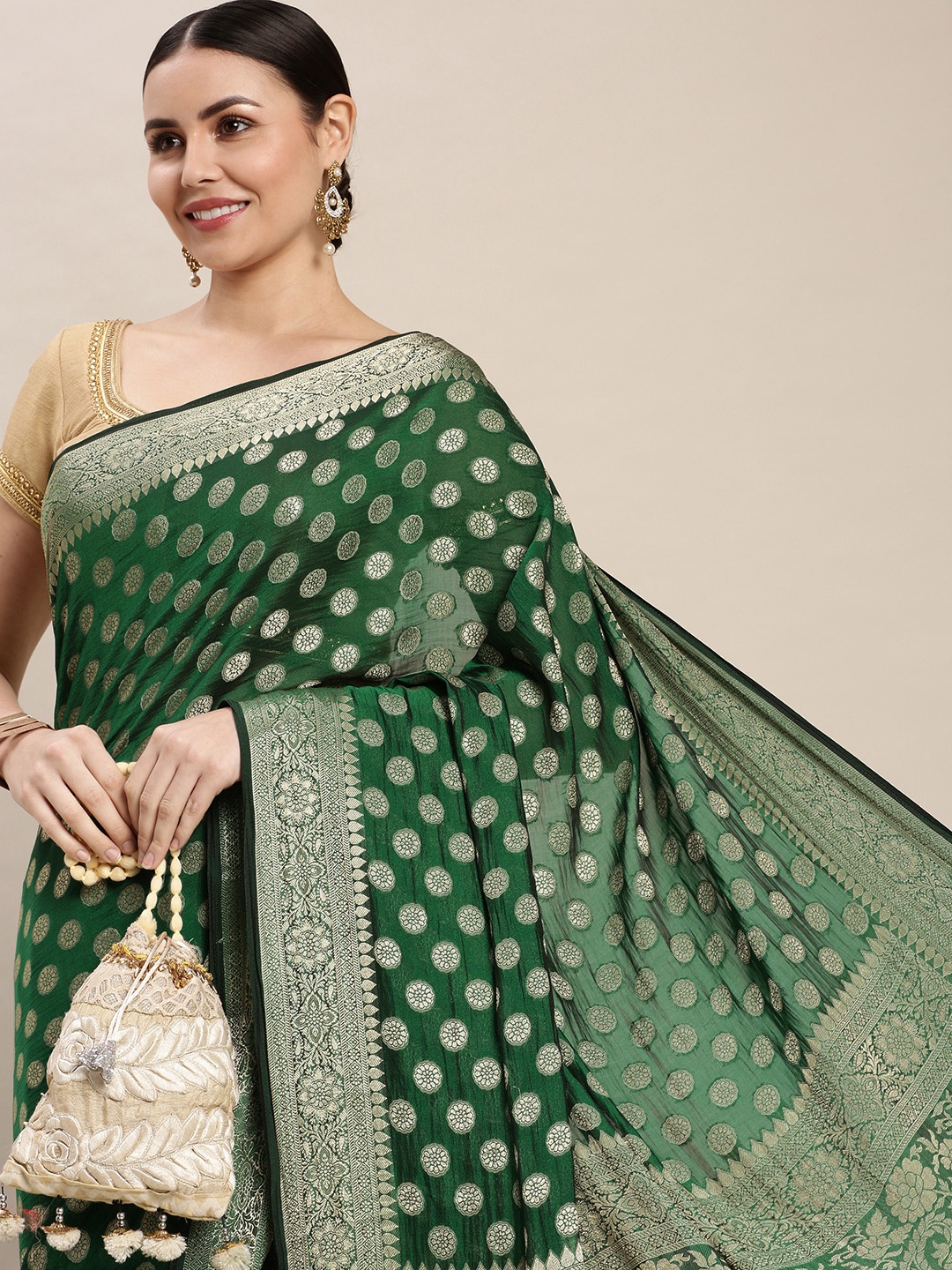 

Rani Saahiba Green & Silver-Toned Woven Design Saree