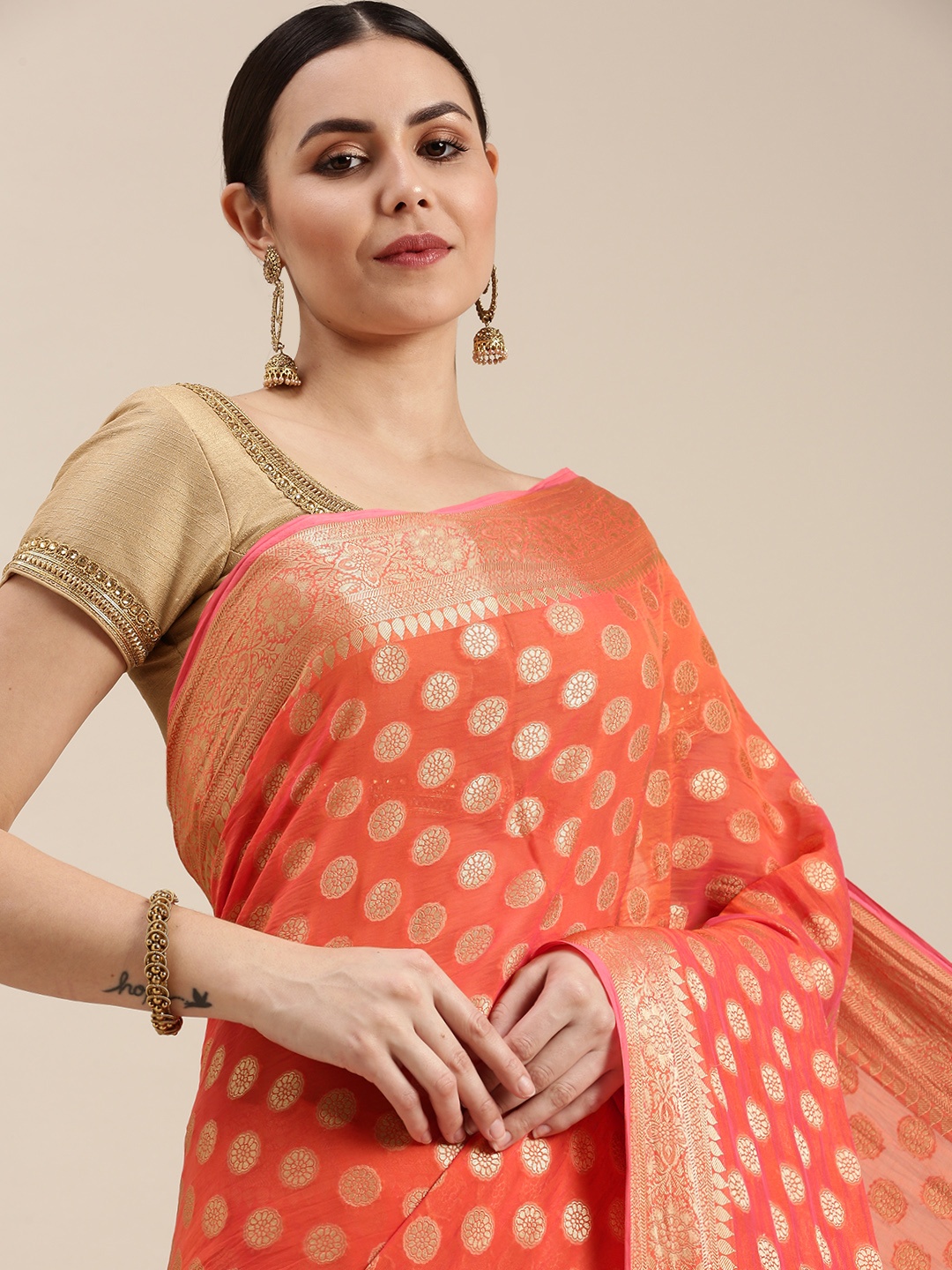 

Rani Saahiba Peach-Coloured & Golden Woven Design Saree