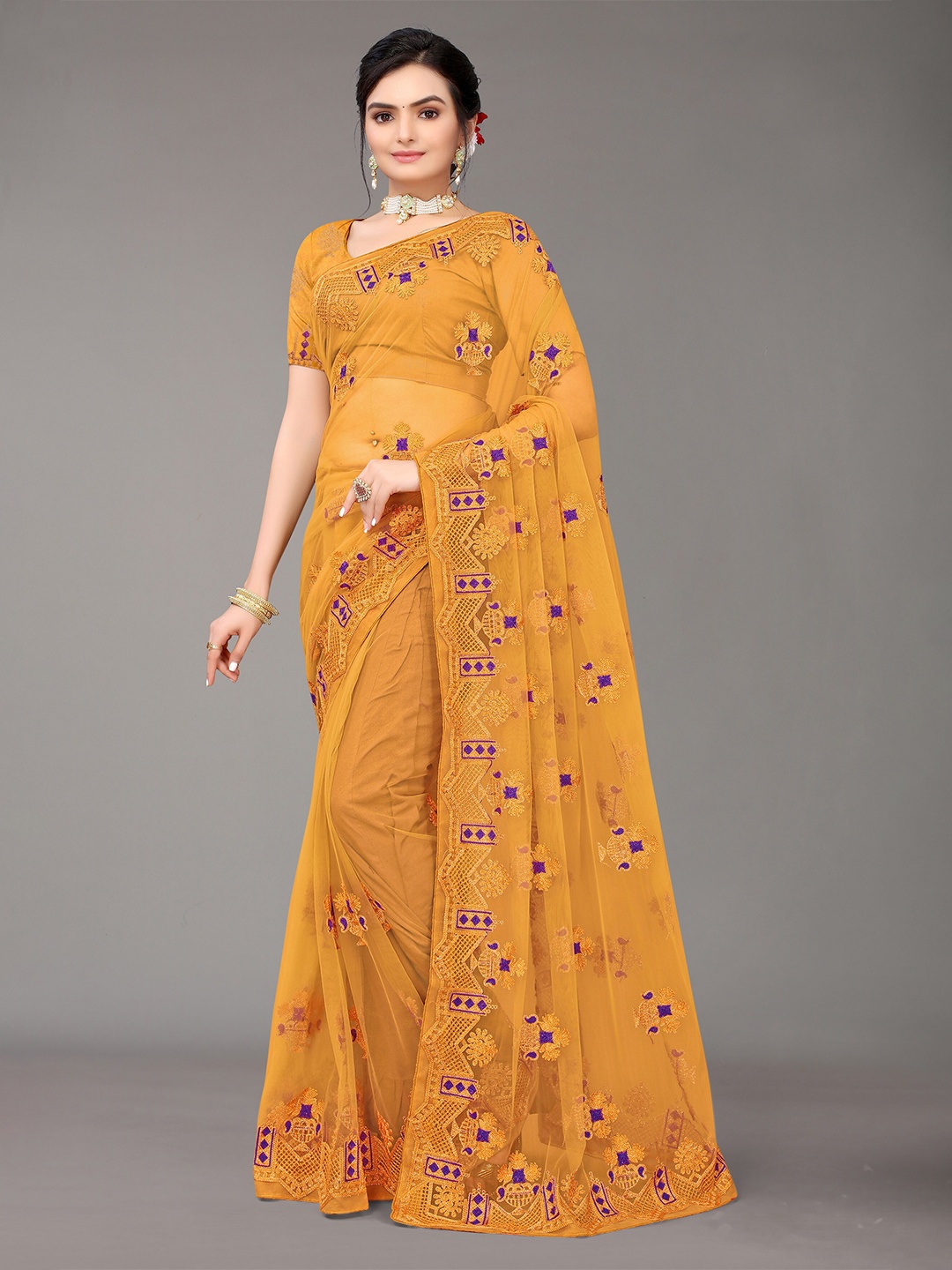 

Nimayaa Mustard & Violet Floral Embroidered Net Heavy Work Saree
