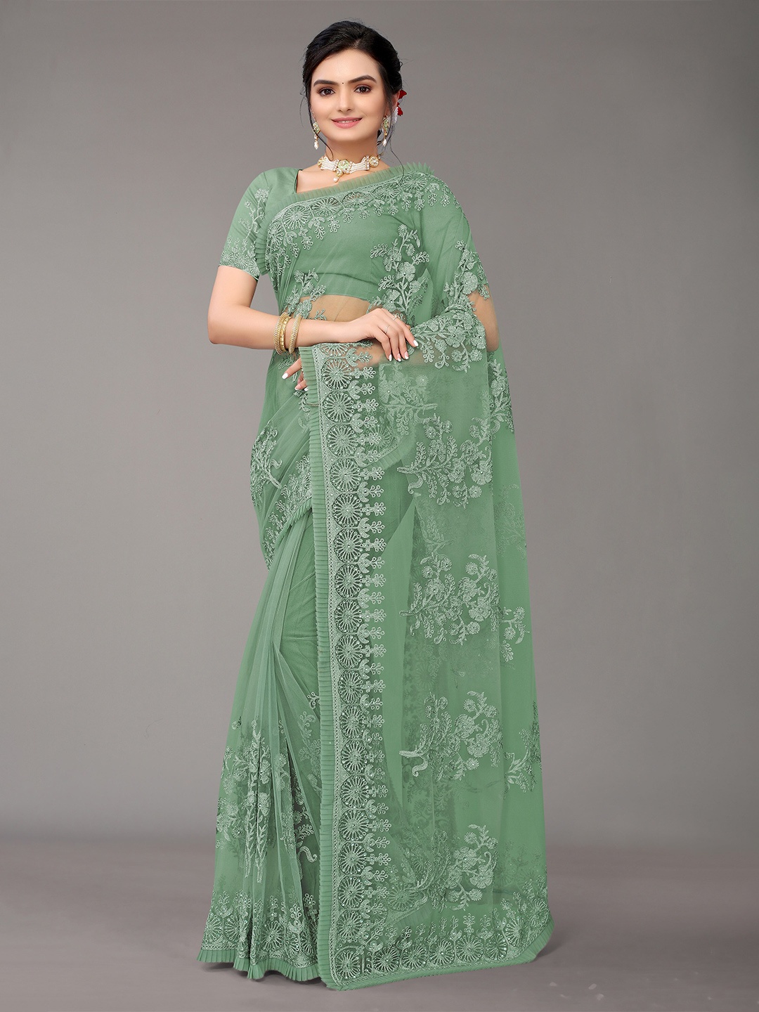 

Nimayaa Green & Silver-Toned Floral Beads and Stones Net Heavy Work Saree