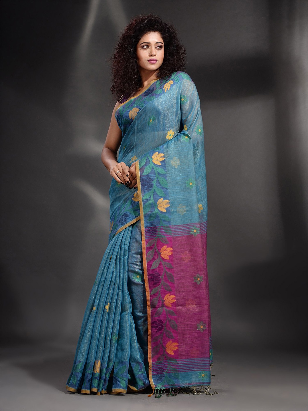 

Arhi Teal Blue & Pink Floral Zari Tissue Saree