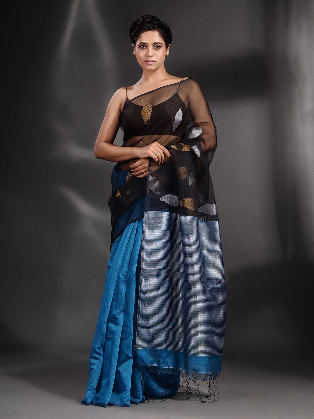 

Arhi Black & Blue Ethnic Motifs Zari Cotton Saree