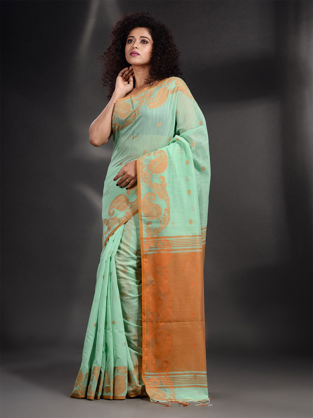 

Arhi women Green & Orange Woven Design Zari Pure Cotton Saree