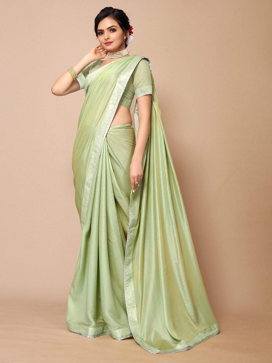 

Mitera Green Satin Silk Embellished Border Saree