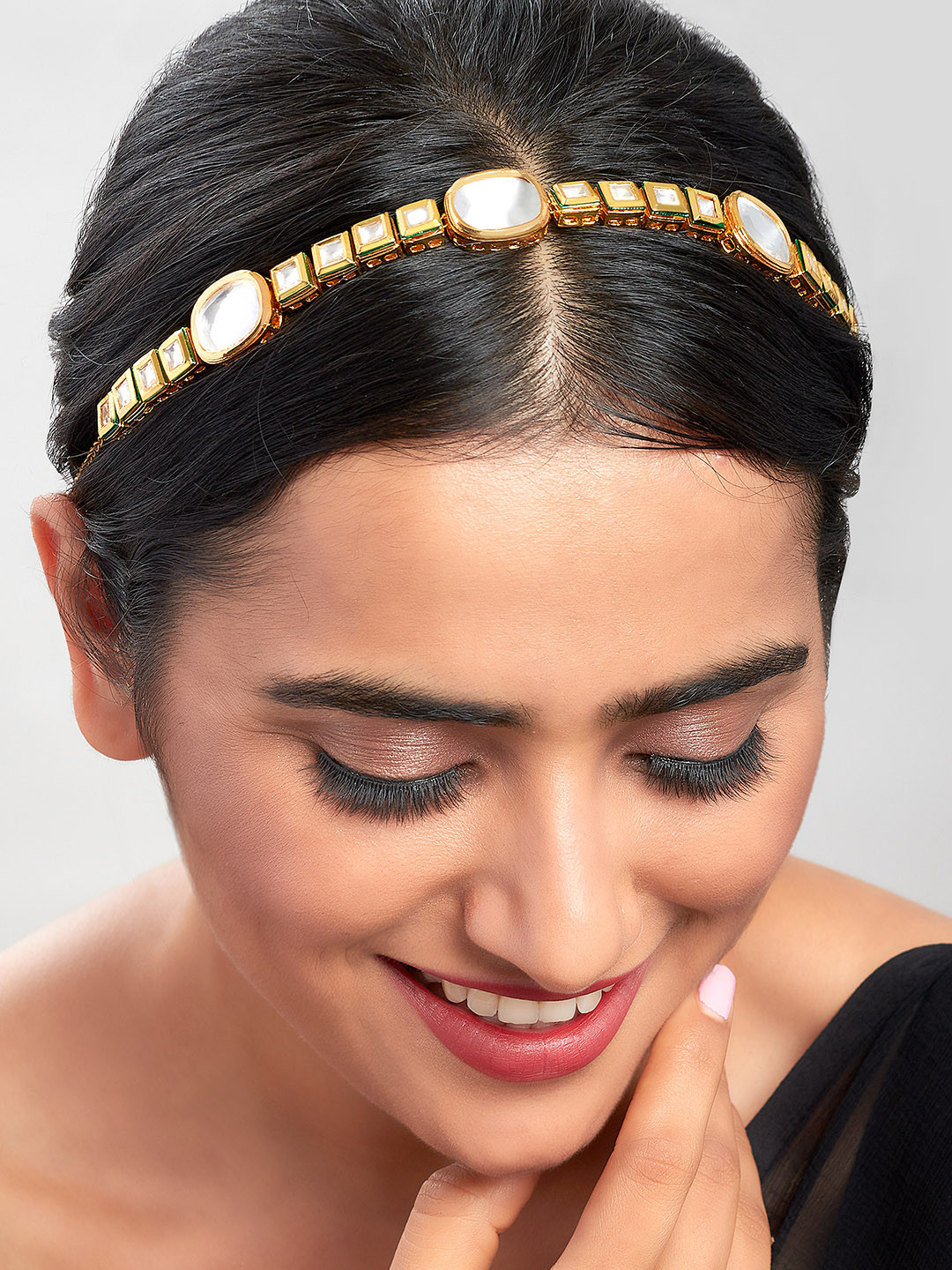

Ahaanya Gold-Plated White Kundan Studded Maang Patti