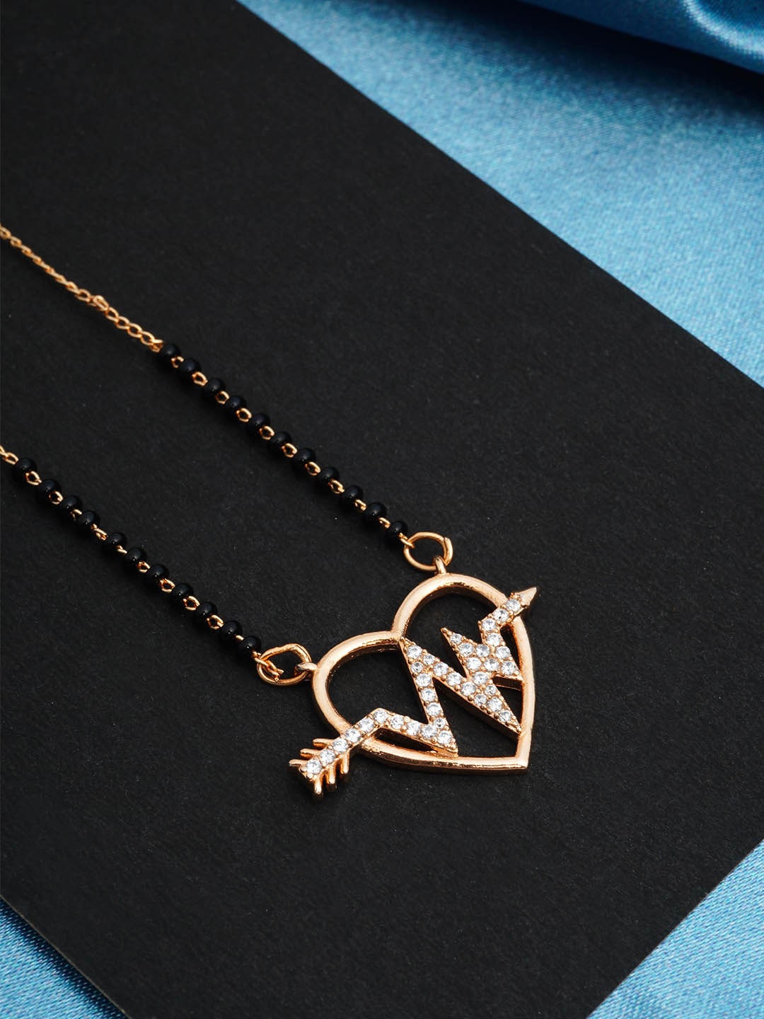 

Urmika Gold-Plated Black Beaded White AD-Studded Mangalsutra