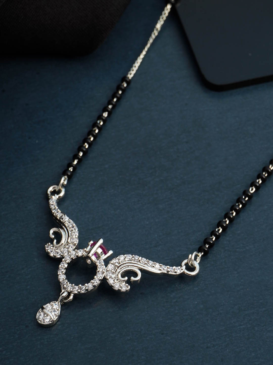 

Urmika Silver Coloured Black Beaded Pink & White AD-Studded Mangalsutra