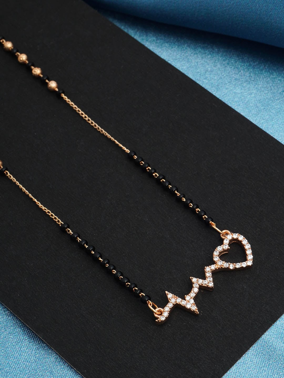 

Urmika Gold-Plated AS Studded Black Beads Mangalsutra, Rose gold