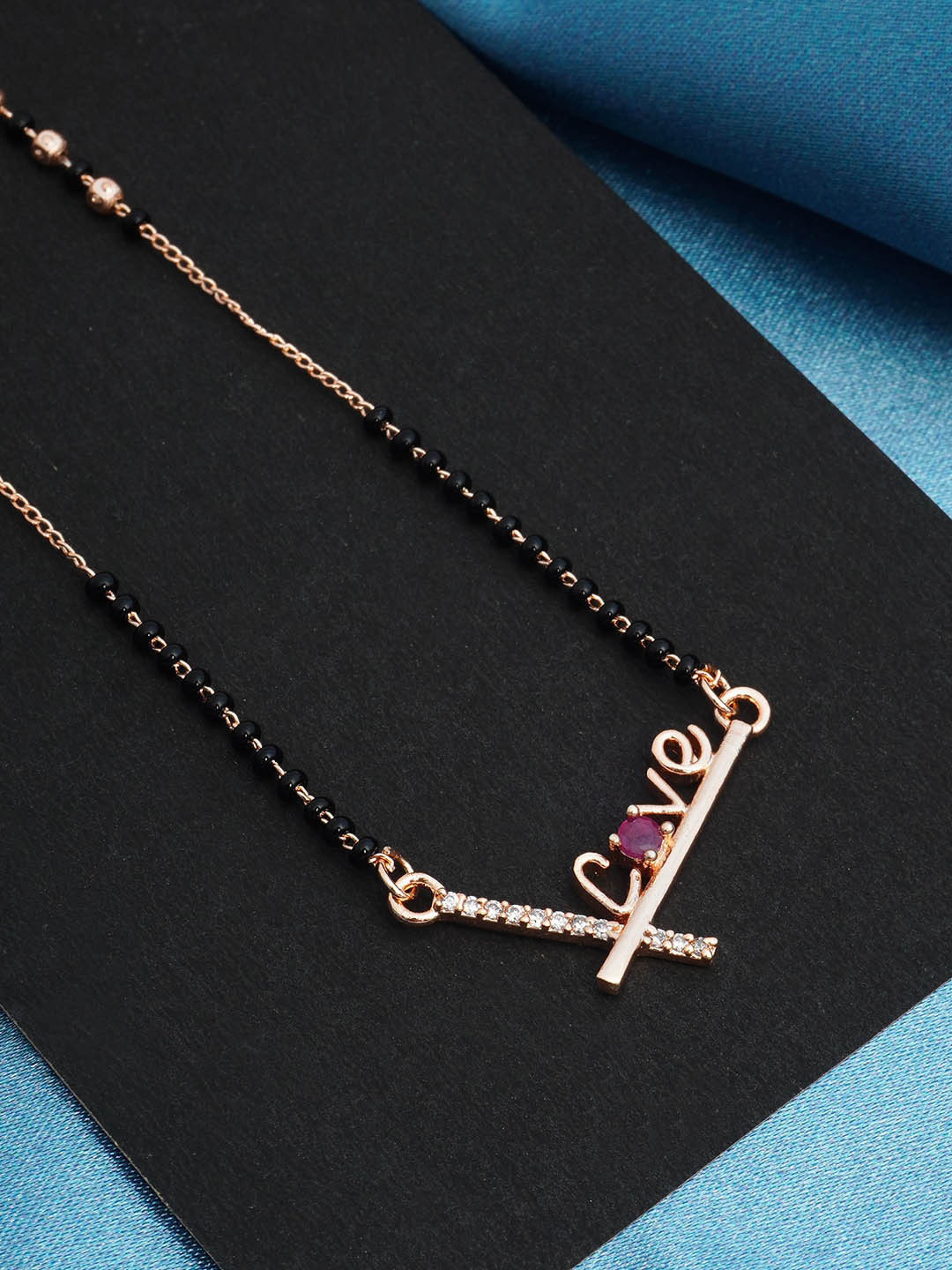 

Urmika Rose Gold-Plated Black Beaded Pink & White AD Studded Mangalsutra