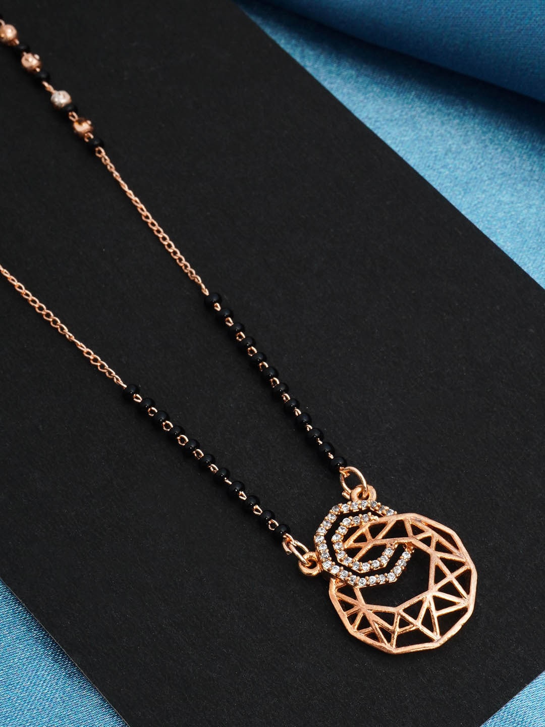

Urmika Gold-Plated Rose Gold Pendant AD Stone & Beaded Studded Mangalsutra