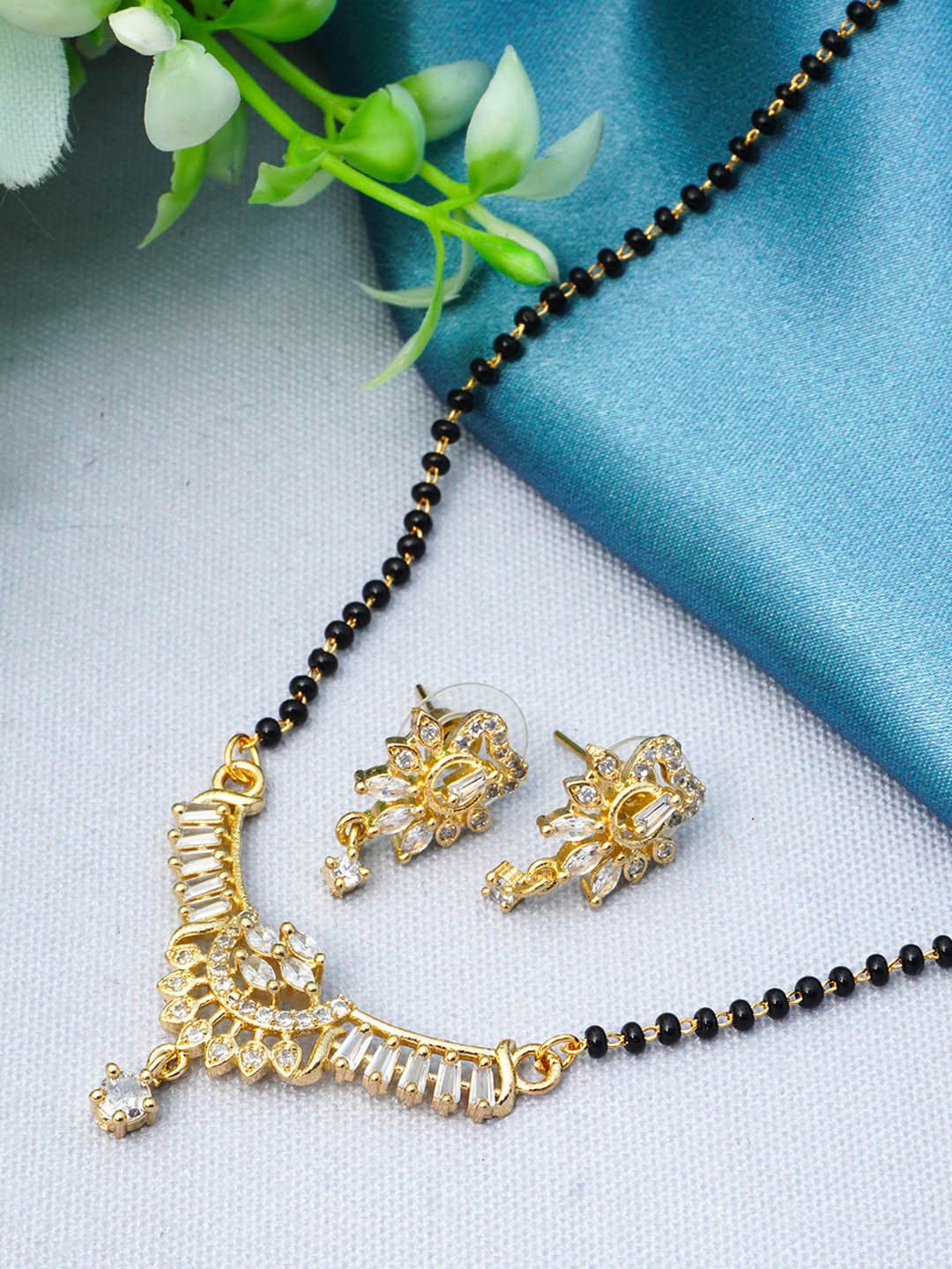 

Urmika Gold-Plated AD-Studded and Beaded Mangalsutra Set