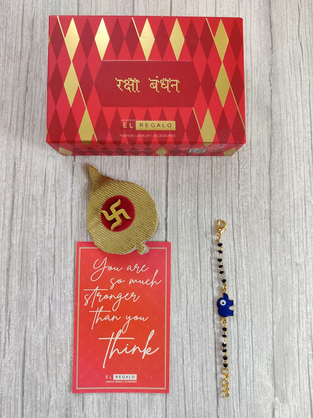 

EL REGALO Gold-Toned Blue Coloured Evil Eye Baby Rakhi Set
