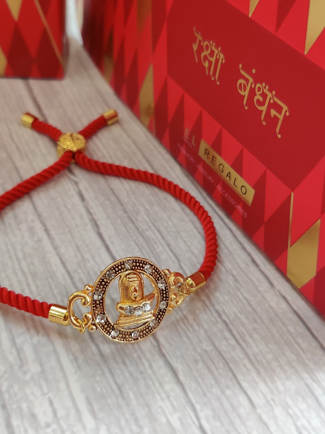 

EL REGALO Gold-Coloured & Red Wrap Around Rakhi With Roli Chawal & Raksha Bandhan Greeting Card