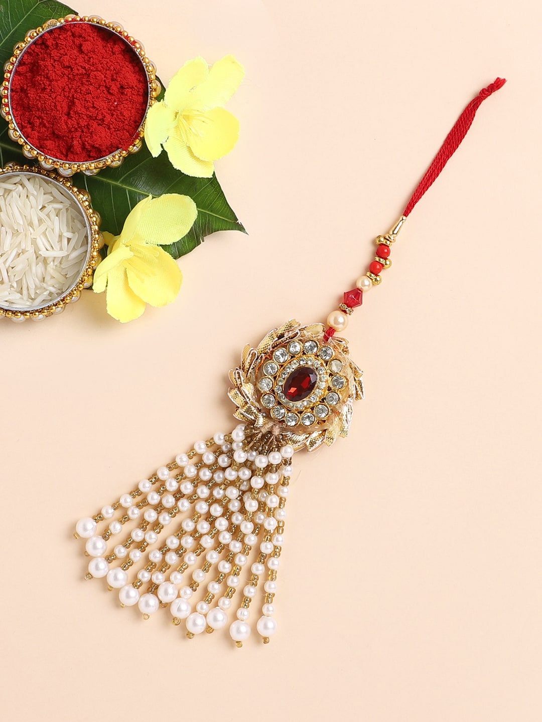 

The Magic Wand Boys Gold-Toned White & Red Stone Studded & Beaded Rakhi