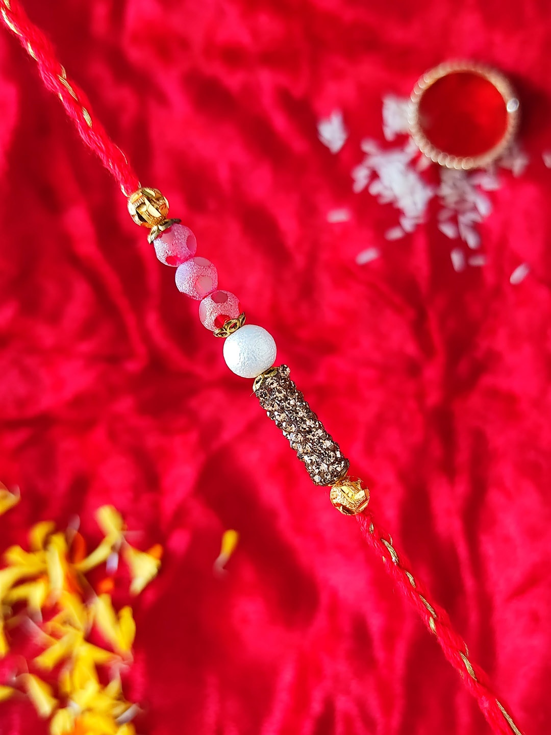 

CRAYTON Men White & Red Beaded Rakhi