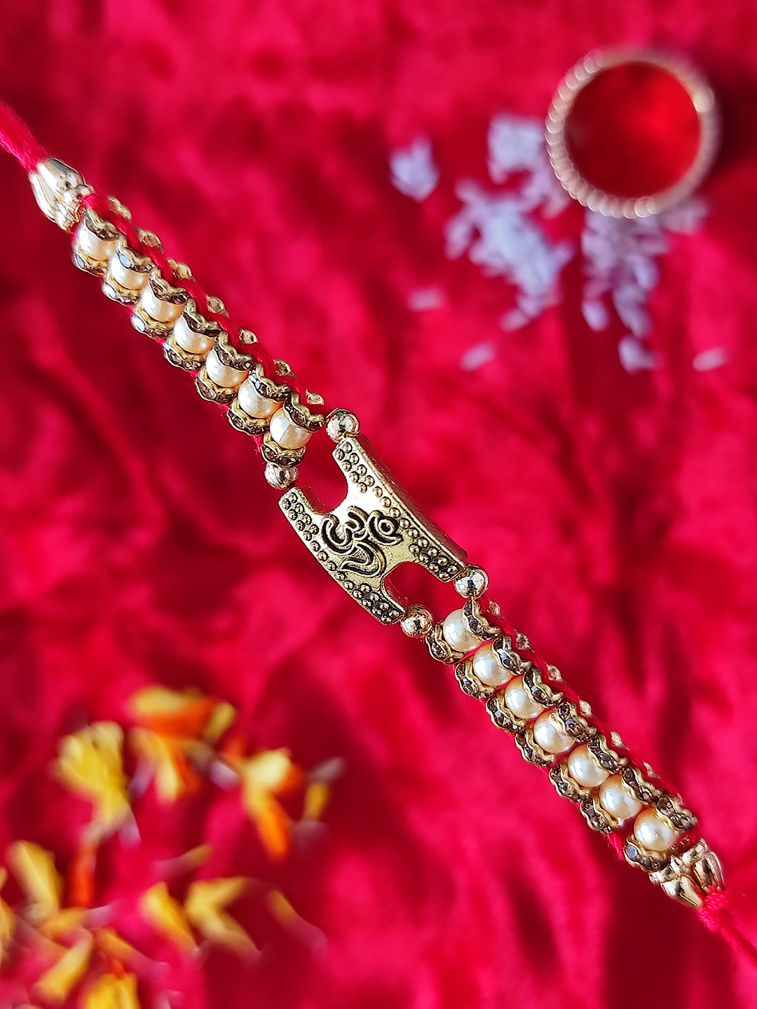 

CRAYTON Red Beaded Om Rakhi