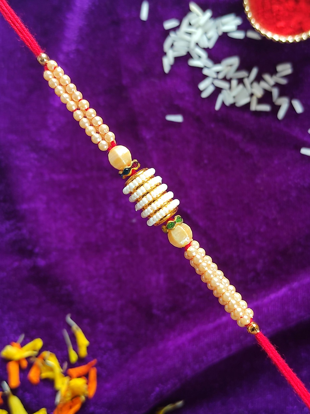

CRAYTON Red Pearl Beaded Rakhi With Roli Chawal