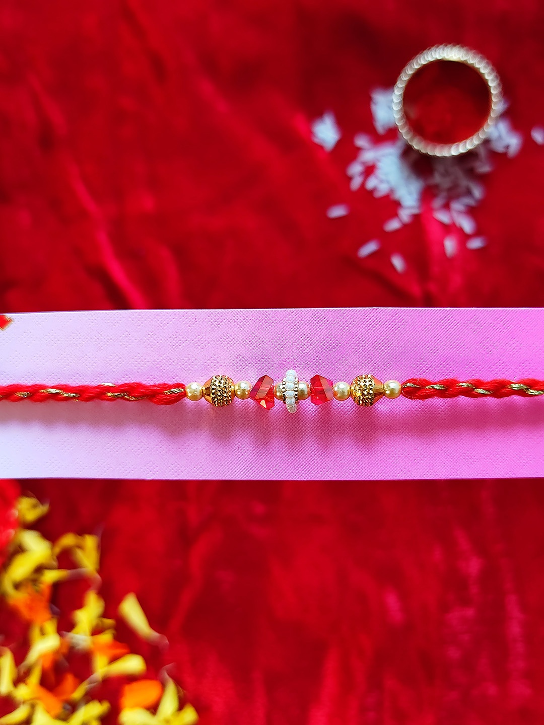 

CRAYTON Red & Gold-Toned Beaded Rakhi With Roli Chawal