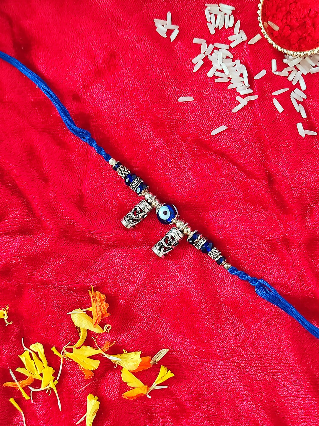 

CRAYTON Gold-Plated Blue Coloured Beaded Evil Eye Rakhi