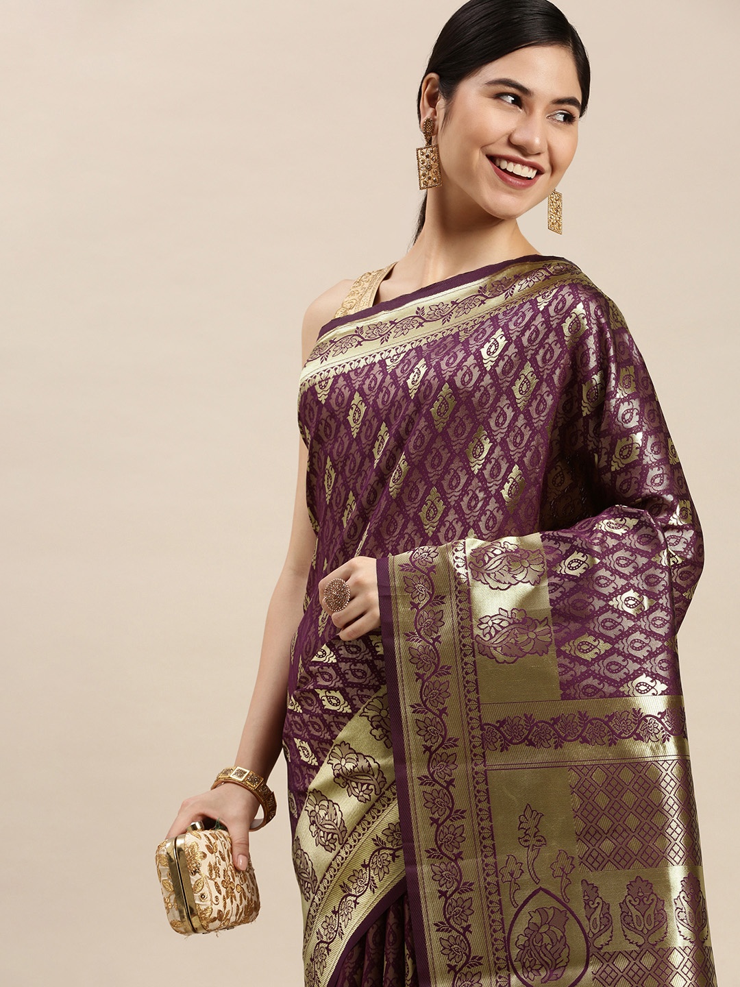 

Hinayat Fashion Purple Ethnic Motifs Zari Silk Blend Banarasi Saree
