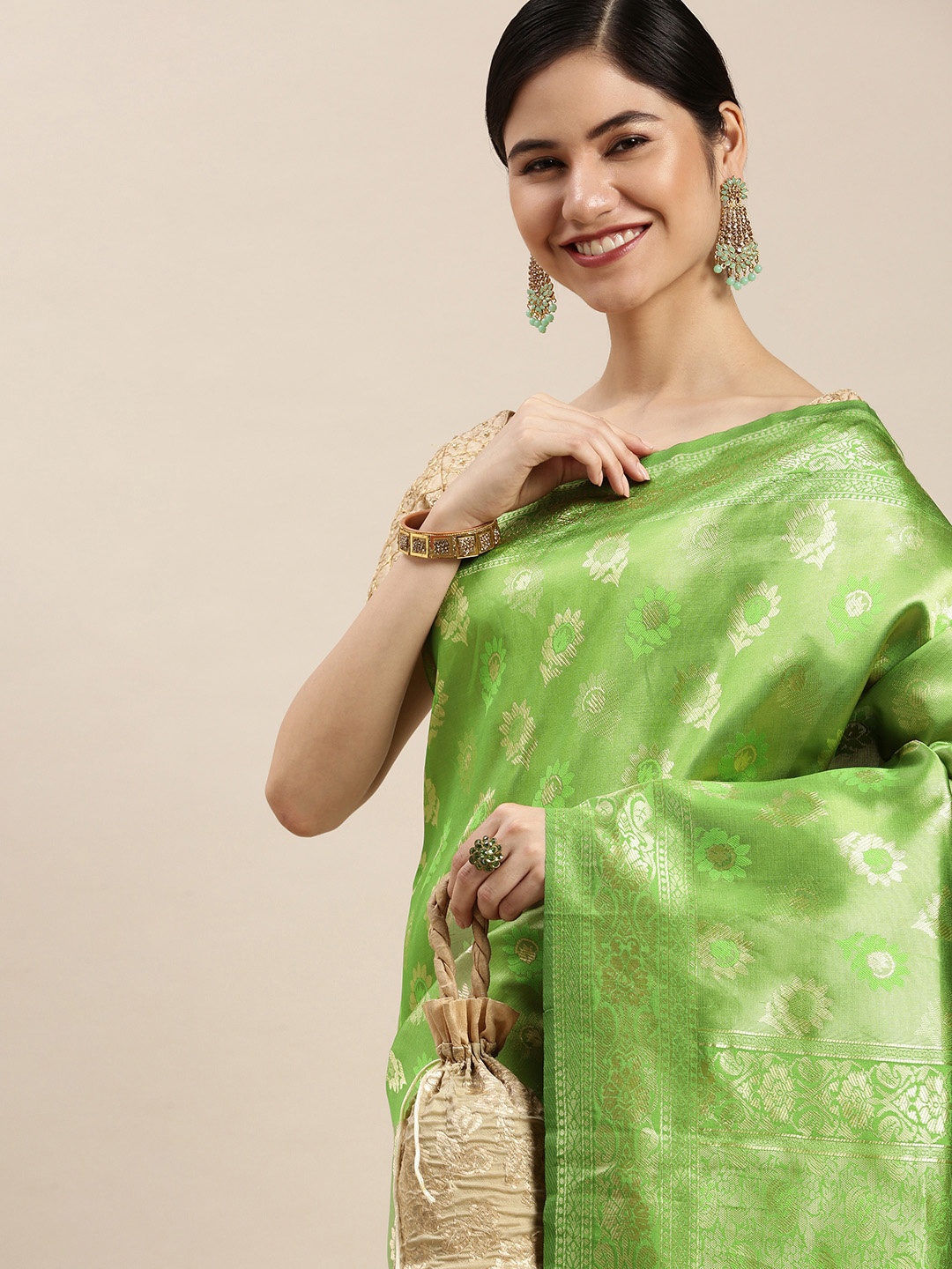 

Hinayat Fashion Lime Green Woven Design Zari Silk Blend Saree